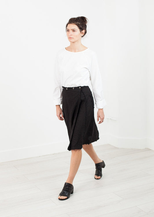 FALDA ENVOLVENTE CON BORDONES EN NEGRO