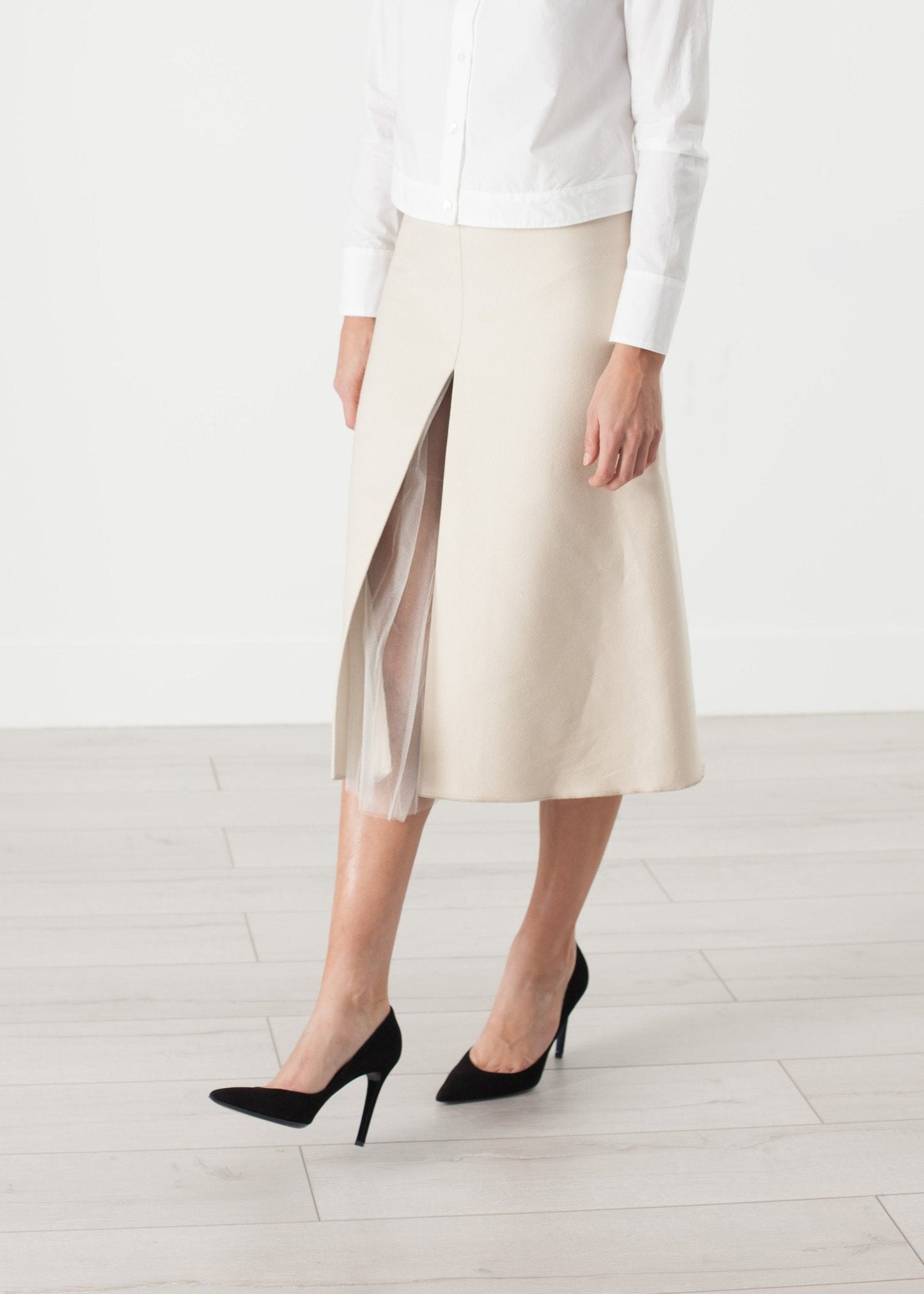 Gonna a pieghe in tulle color crema