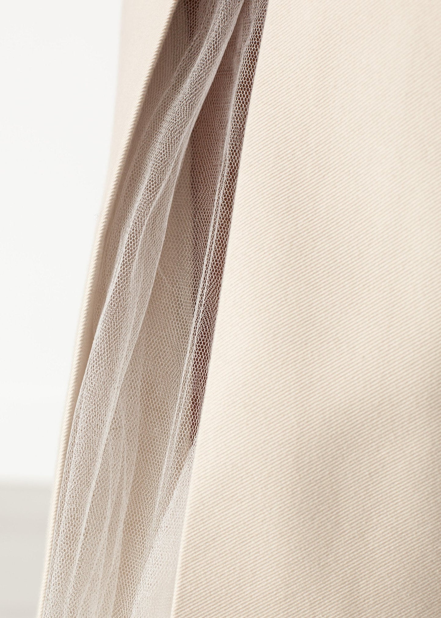 Gonna a pieghe in tulle color crema