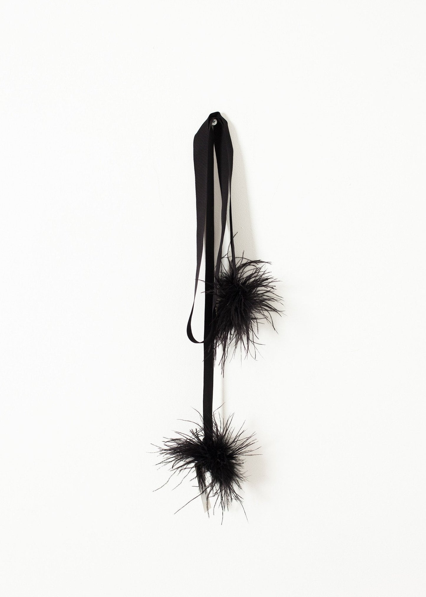 Fajín de plumas