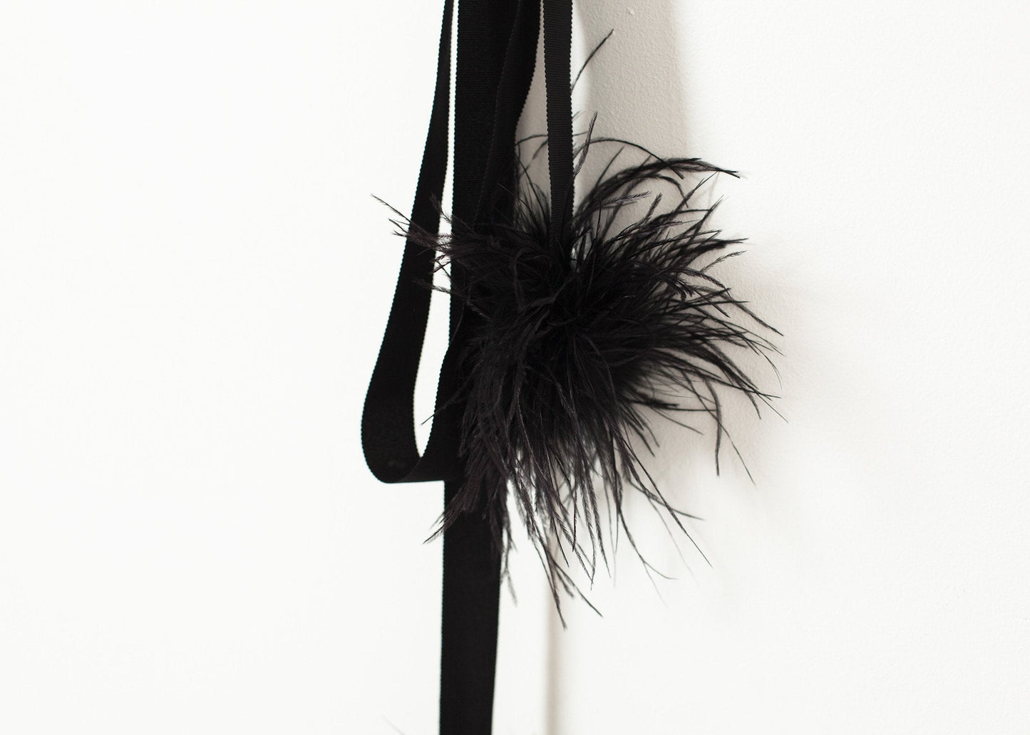 Fajín de plumas